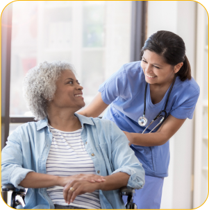 A nurse pushing an elderly patient in a wheelchair after a successful neurological rehabilitation session.